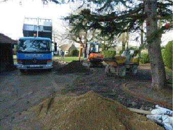 large truck depositing soil